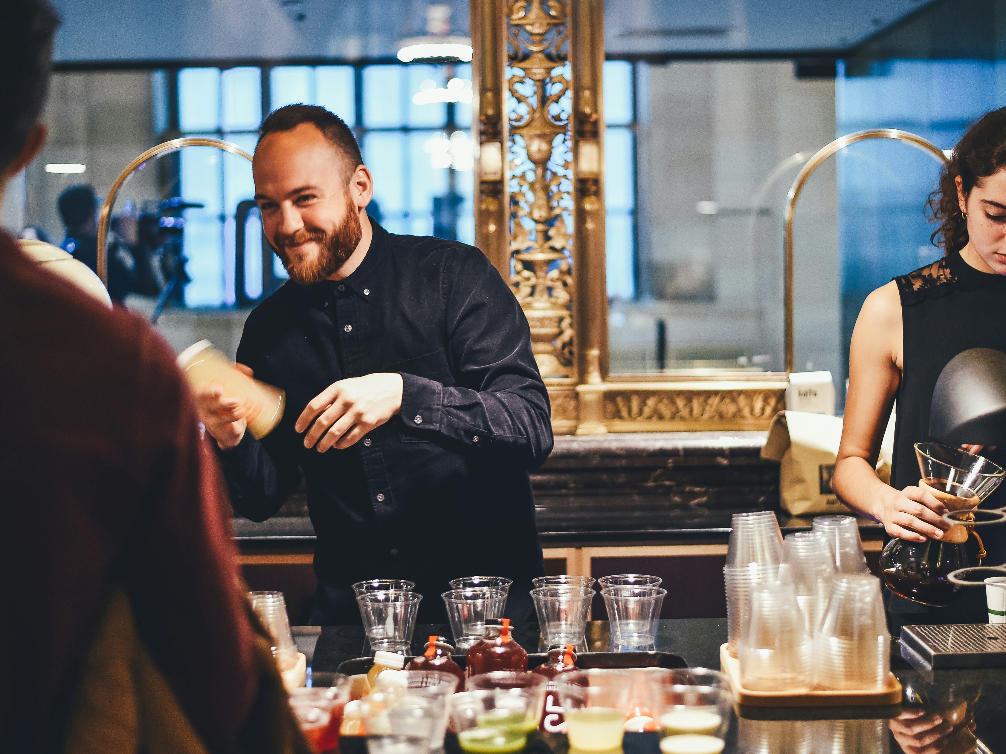 Group gathered around a bar station