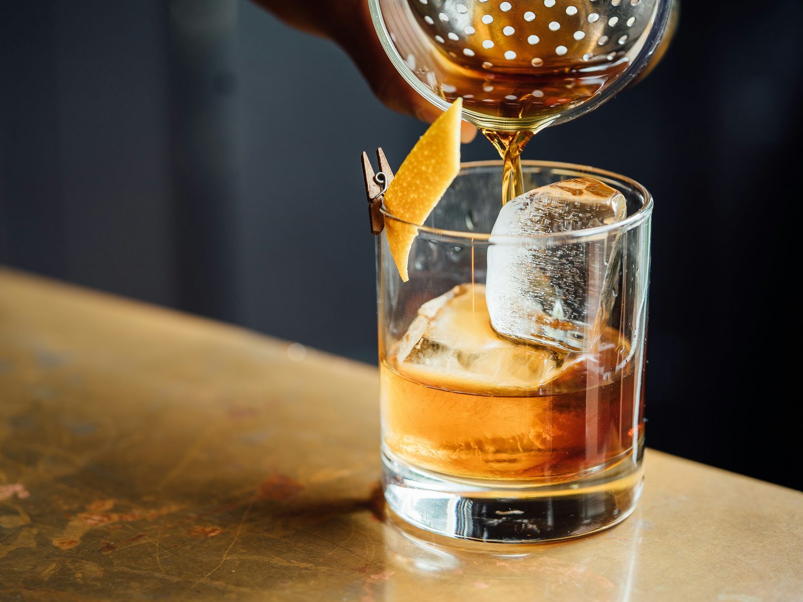 Team members hands-on at a single cocktail station