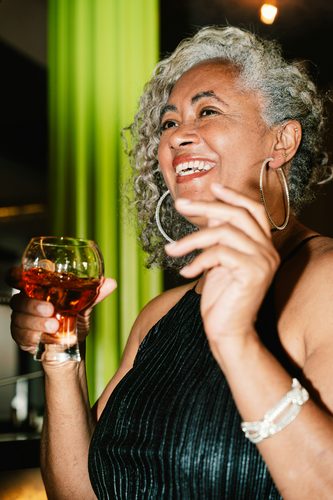 Negroni and martini on a bar counter