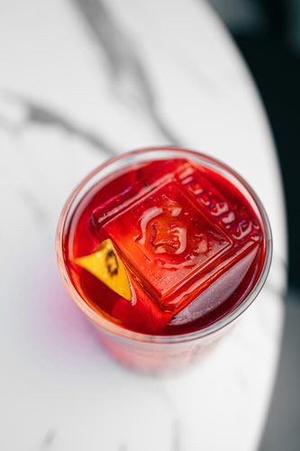 Overhead view of a Negroni with orange peel